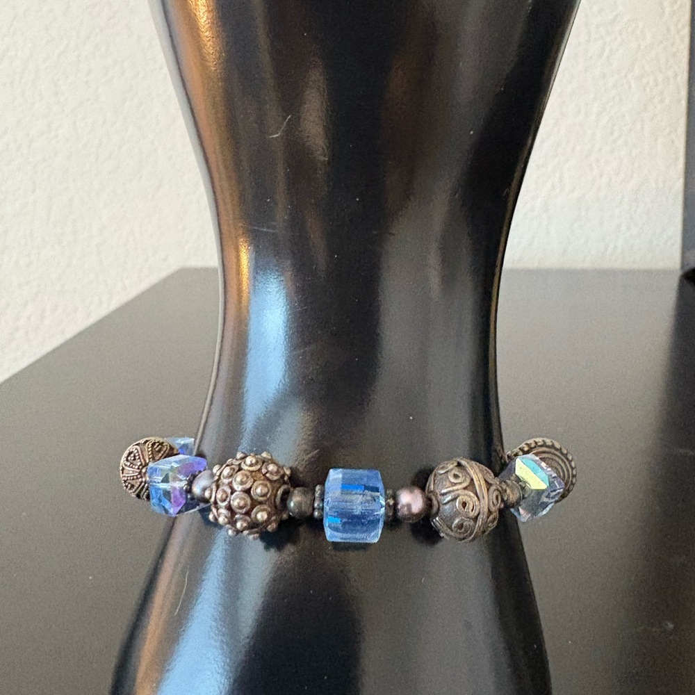 Blue and Sterling Silver Charm Bracelet with Ornate Beads
